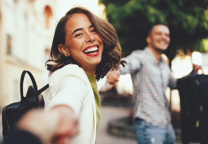 happy-university-student-with-friends-on-campus UBC Dental Clinic